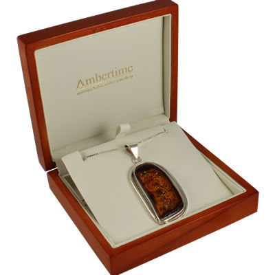 AM1264 Long Handmade Amber Slice Pendant