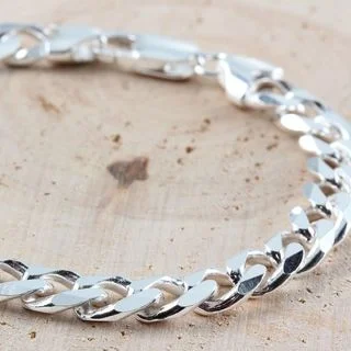 Our new 7.8mm Silver Curb Bracelet  has been engineered with extra durable end caps