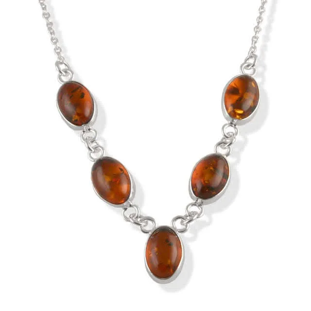 Amber Silver Necklace - Five oval pieces of cognac Baltic amber each measuring 11mm x 7mm