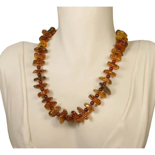 Created with round cherry amber beads between large honey amber nuggets