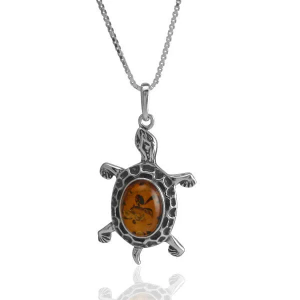 Amber Tortoise Pendant - Oxidised Silver Detailing 