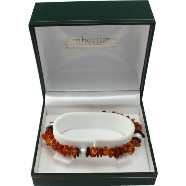 This beautiful pearl and amber stretch bracelet is presented in a luxury gift box