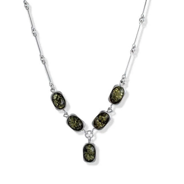 Silver Ovals Necklace set with five pieces of green baltic amber