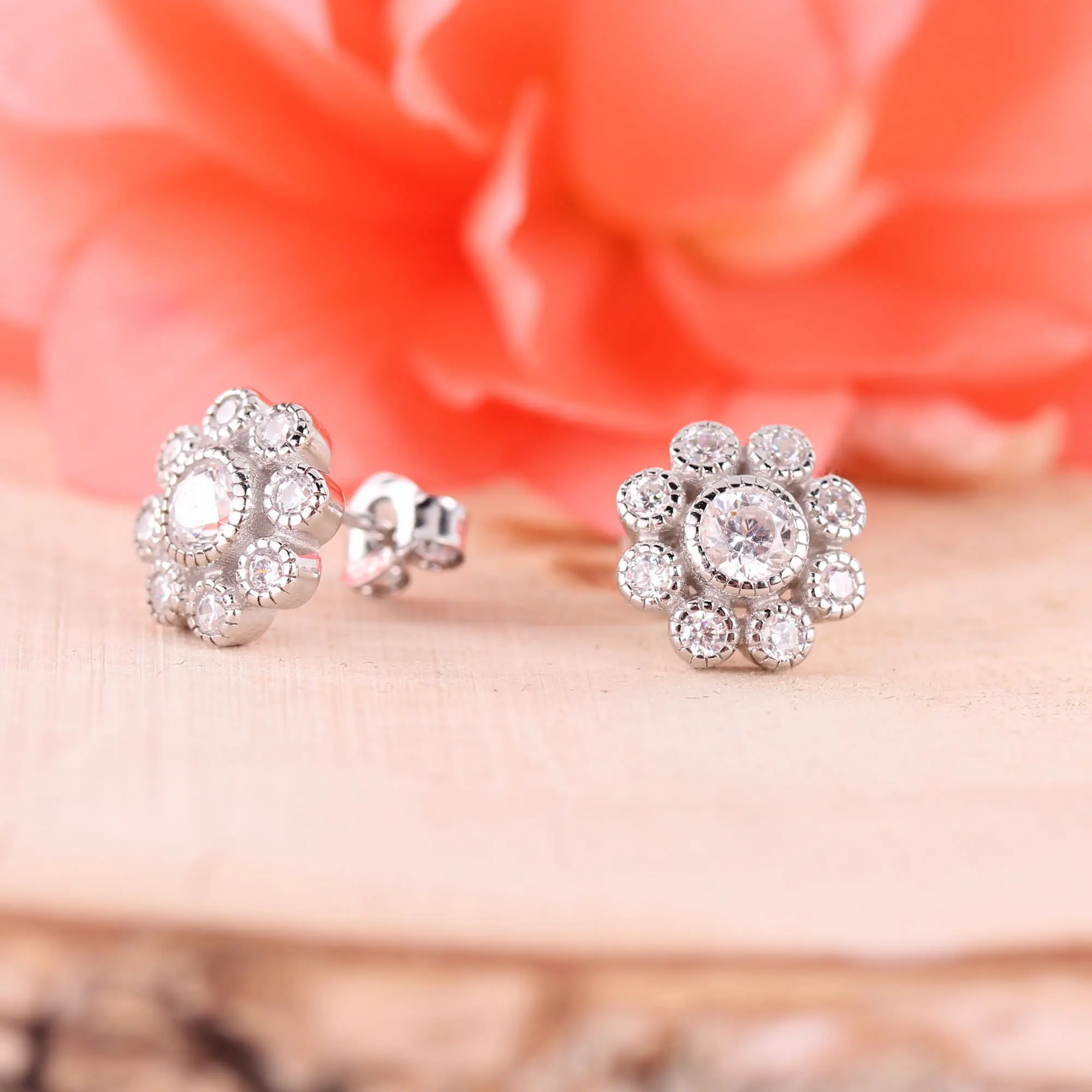 Pearl and CZ flower earrings in platinum finish 