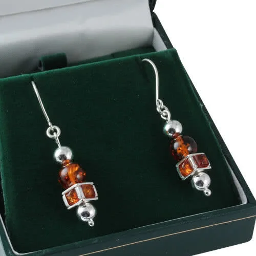 These beautiful amber earrings look heavy but are quite light and so very comfortable to wear