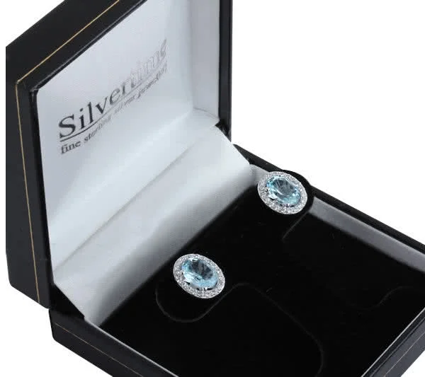thumbnail image 2 of .925 Sterling Silver Oval Simulated Blue Topaz Stud Earrings (2.00 CTTW) 2 of 6