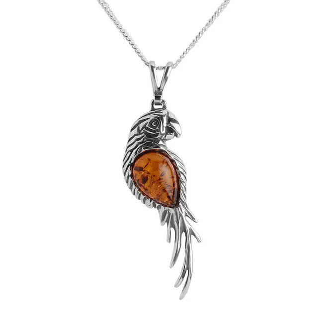 Baltic Amber Macaw Parrot Pendant detailed with intricate oxidised silver detailing