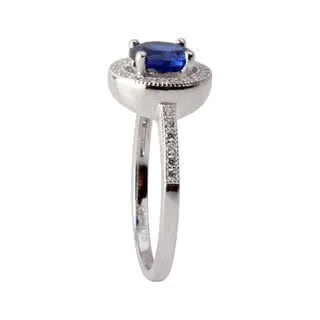 A fabulous ring that looks like 18ct white gold diamonds and Sapphire