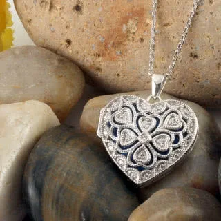 Four leaf clover heart locket