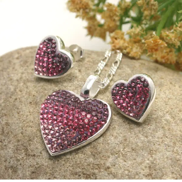 Earrings measure 10mm and the Pendant measures 25mm including bale